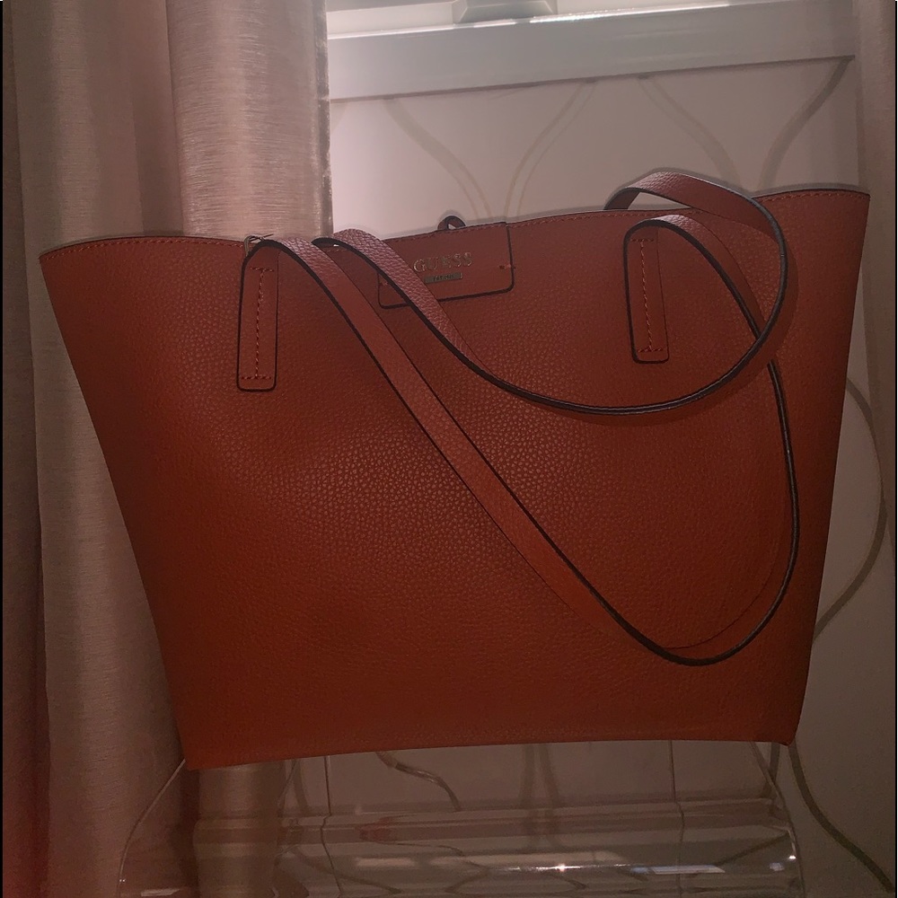BRAND NEW. Orange Guess tote.